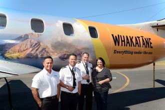 Adrian Amai of JNP Aviation, Captain Duane Emeny and First Officer John Aholelei of Air Chathams, and Roslyn Mortimer of Whakatāne District Council with the newly branded Metroliner at Whakatāne Airport.