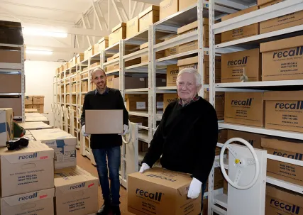 Council staff package up collection items for temporary relocation.