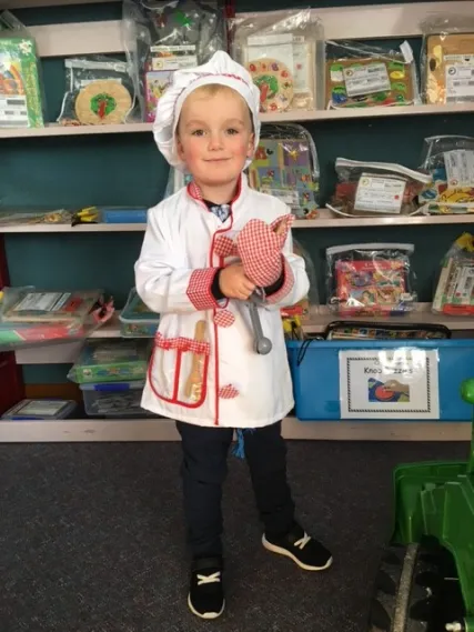 Josh Pickles enjoys toy library chef costume