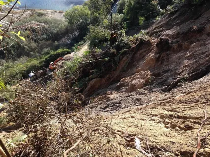 Slip blocking both lanes of State Highway 2
